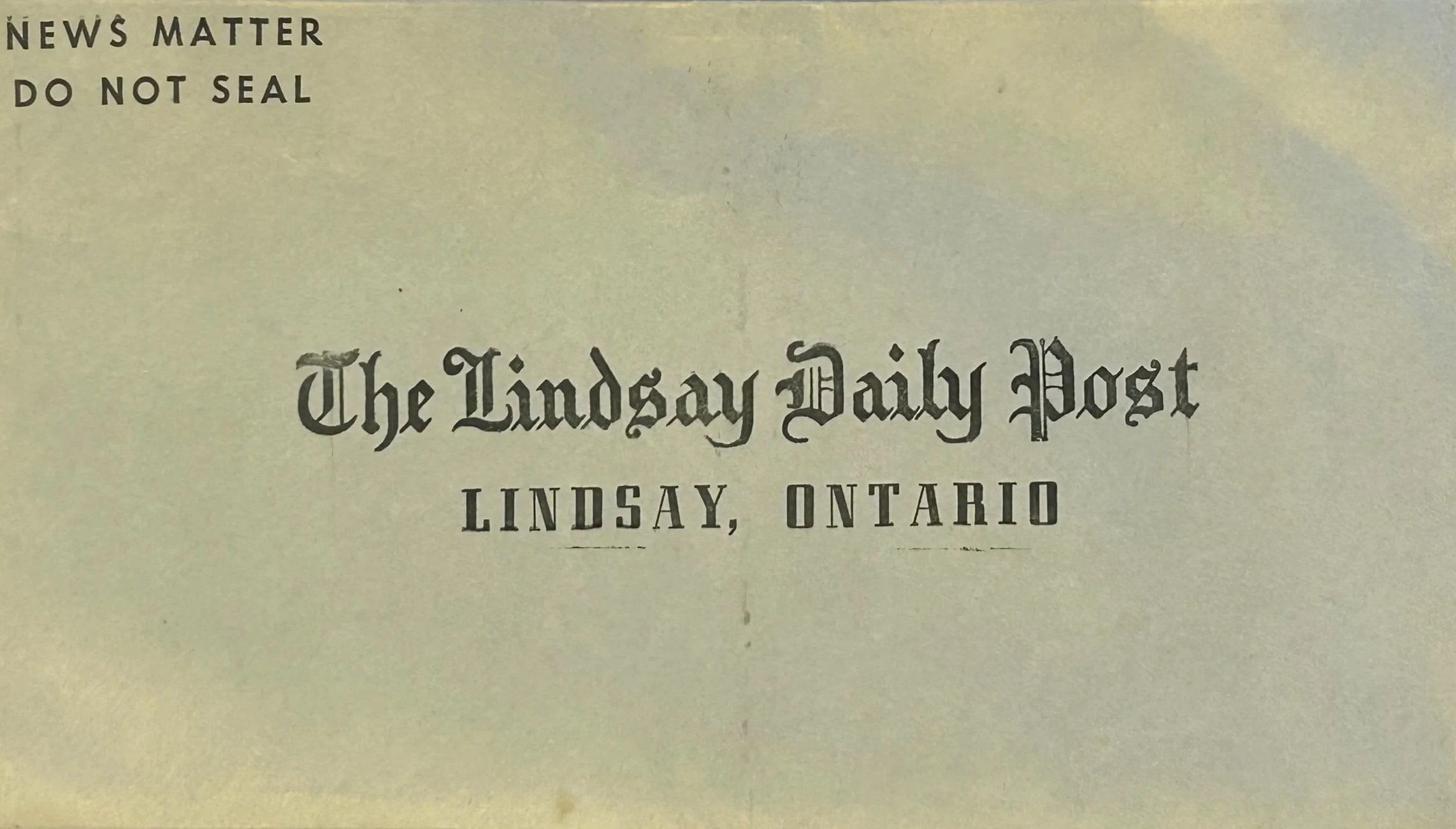 Envelope with text "NEWS MATTER DO NOT SEAL" and "The Lindsay Daily Post, Lindsay, Ontario."