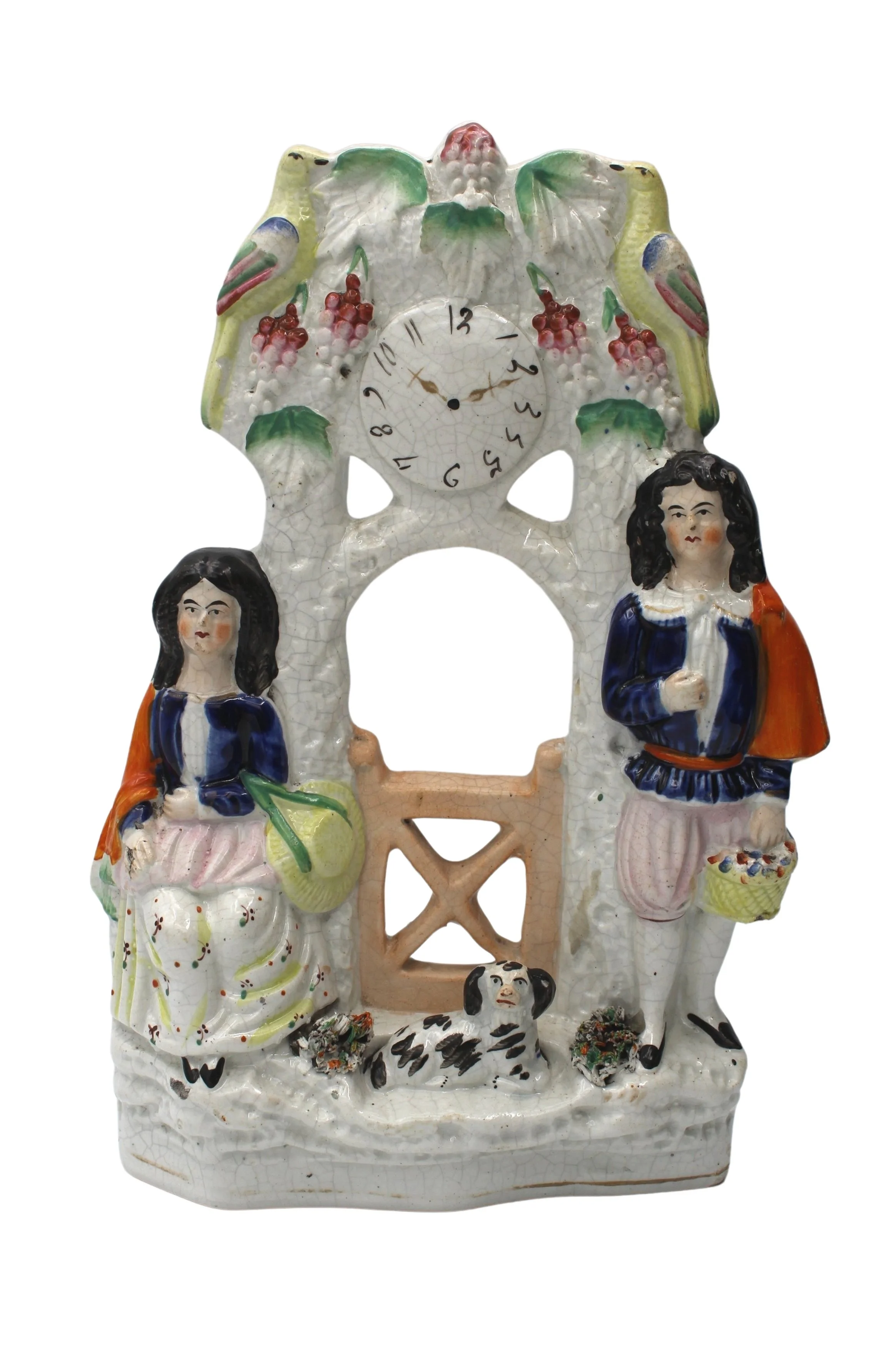 Vintage ceramic mantel clock with figurines and decorative birds