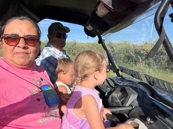 Lea, her partner Terry & grandkids.jpg