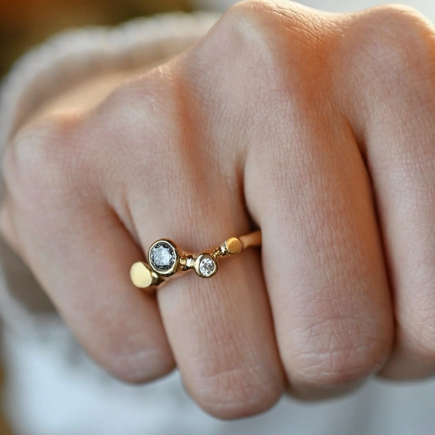 The most meaningful jewelry becomes familiar.

You stop noticing it in the mirror.
Your hand knows the weight of it.
The gold warms against your skin.

It moves with you through ordinary moments. Morning light. Workdays. Evenings out.

Over time, the