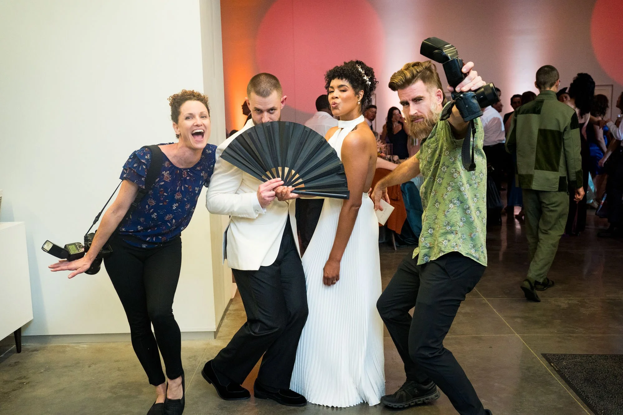 sarah-jeremy-sarah-corbett-photography-group-photo-with-couple-at-wedding-having-fun.jpg