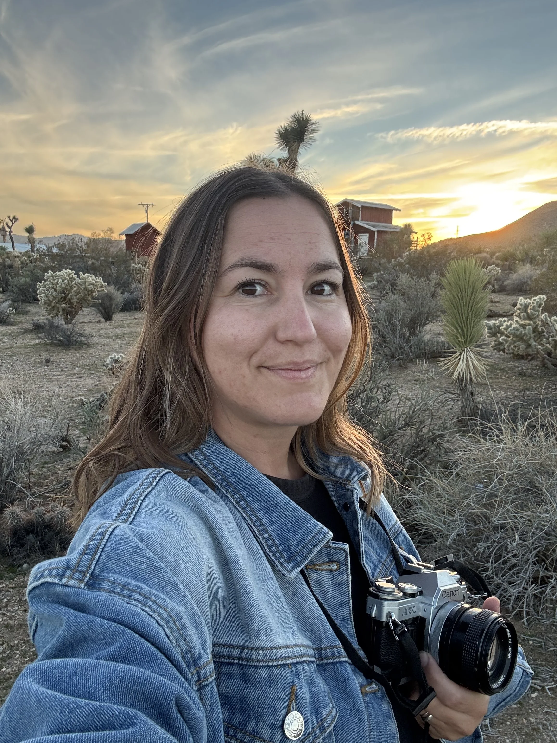 La Petite Photo Margot with a film camera in Joshua Tree National Park