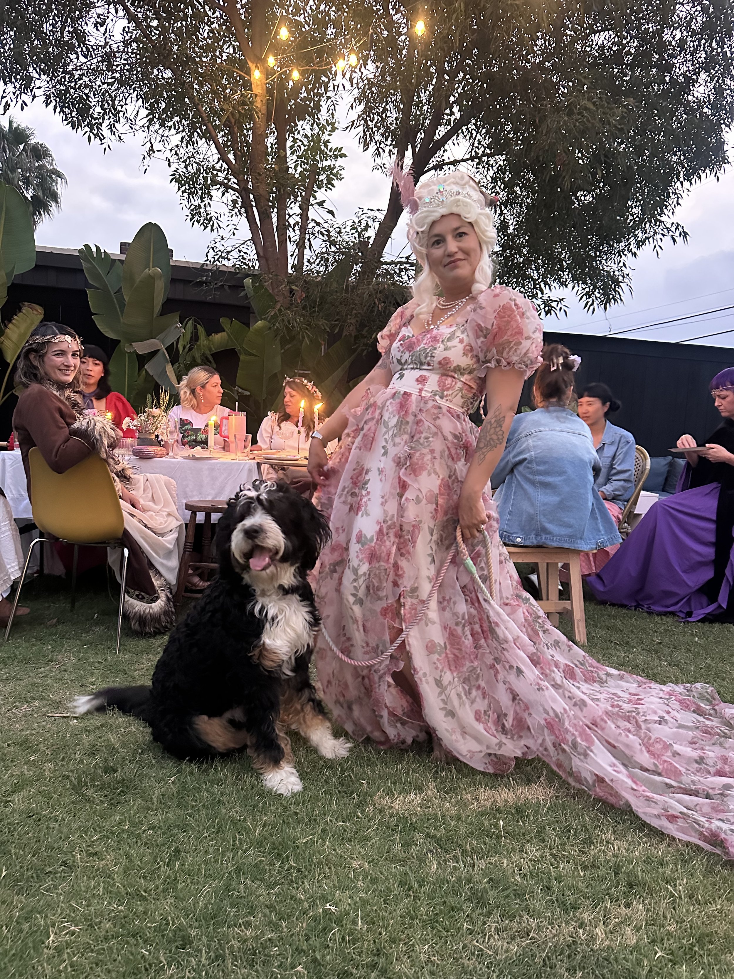 La Petite Photo Margot as a French queen and her bernedoodle
