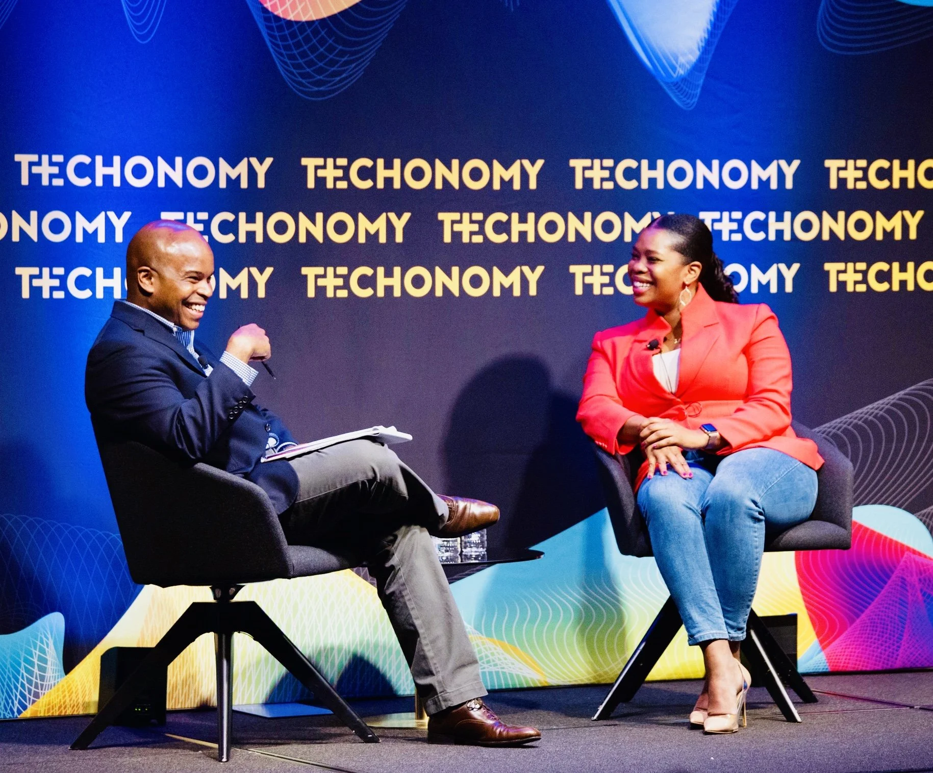 Steven Gray interviewing entrepreneur Jasmine Crowe at at Techonomy conference in New York.
