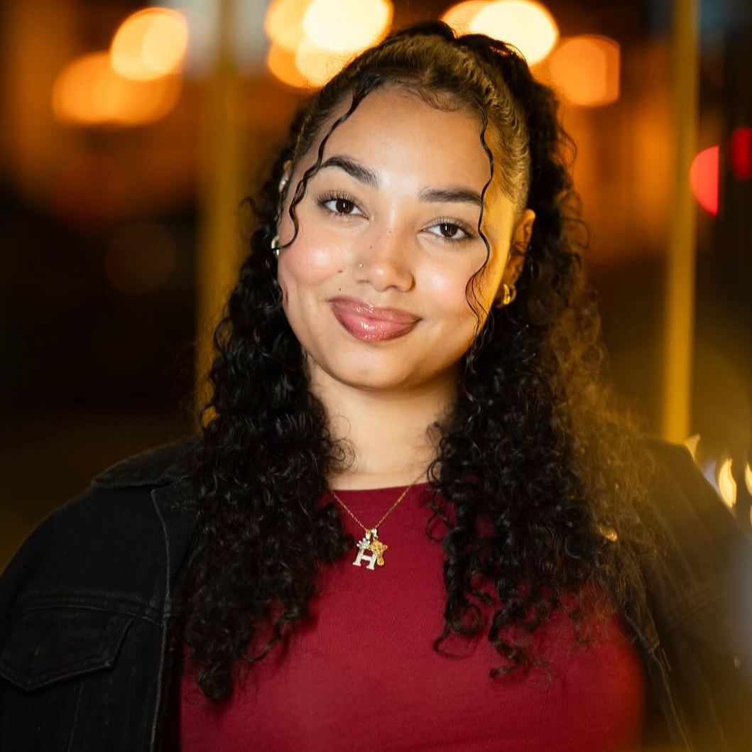 Professional portrait of Hazel, Orlando nail technician providing Gel-X nails, builder gel manicures, gel pedicures and custom nail art at So Pretty Beauty Bar.