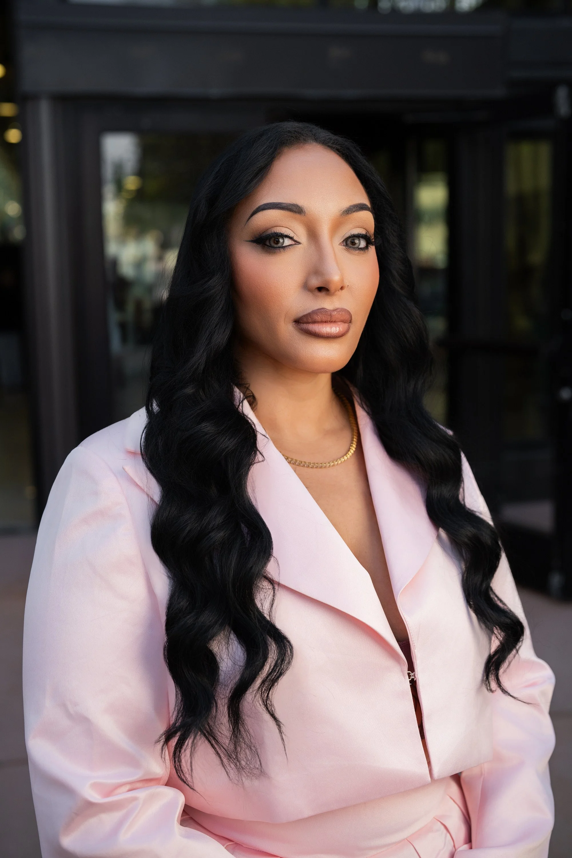 business woman with soft glam makeup looking polished and elevated and feeling confident after getting her makeup done at so pretty beauty bar