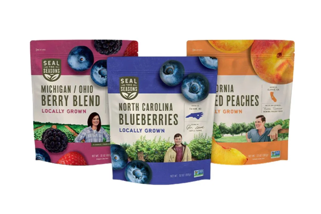 Three bags of fresh berries and fruit from Seal the Seasons, including Michigan and Ohio berry blend, North Carolina blueberries, and California dried peaches.