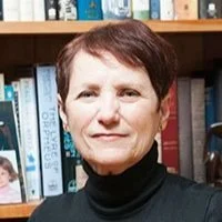 Portrait of Poet Olivia Stiffler looking at camera