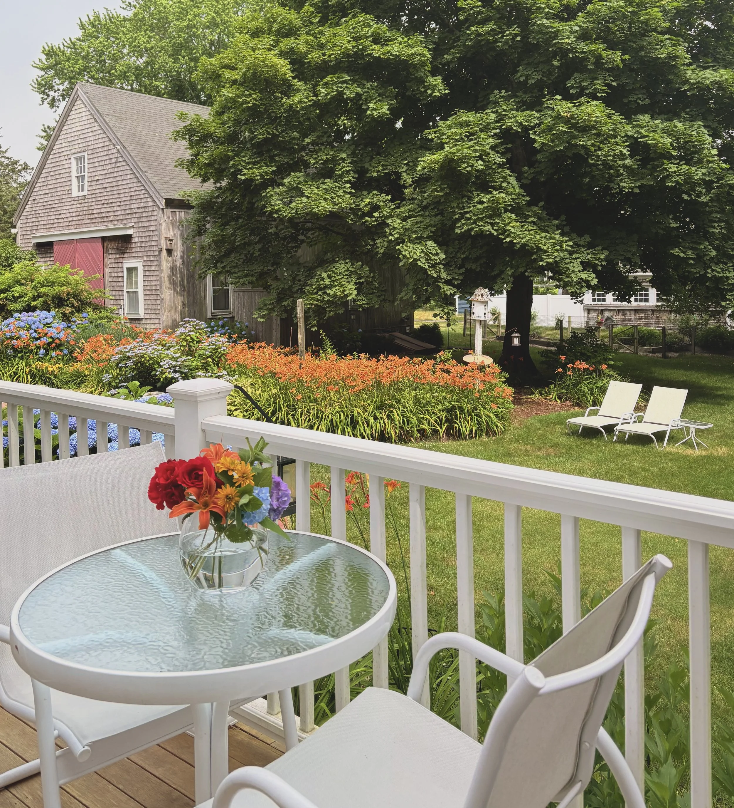 Flowers on porch table Square.jpeg
