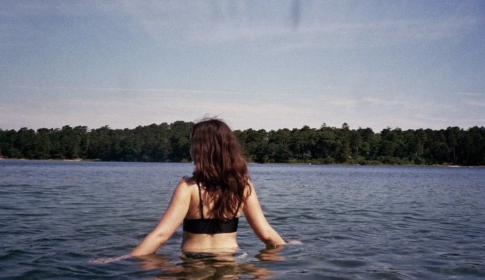 Girl with long hair in ocean