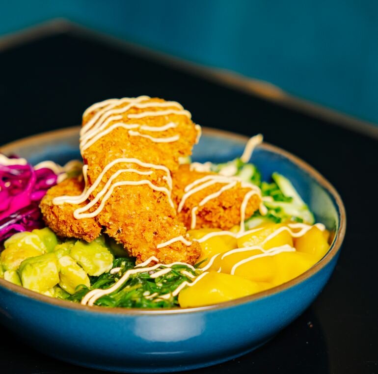 Try our Crispy Chicken pok&eacute; bowl with cucumber, mango, avocado, edamame and yakisoba sauce. Pleasing to the eye and yummy to the tummy! 🤩

We&rsquo;re open for delivery and take away, so you can enjoy your night with some delicious food. 🥢

