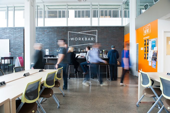 tables and coffee bar area Workbar_workplace_design_by_Anderson_Porter_Design.jpg