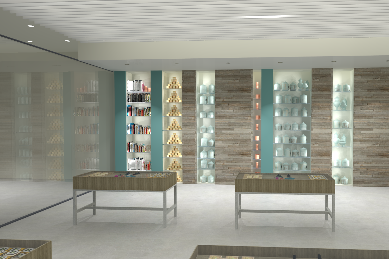Interior of a modern store or showroom with shelves of books, decorative jars, and made of wood and brick accents, with tables displaying small items.