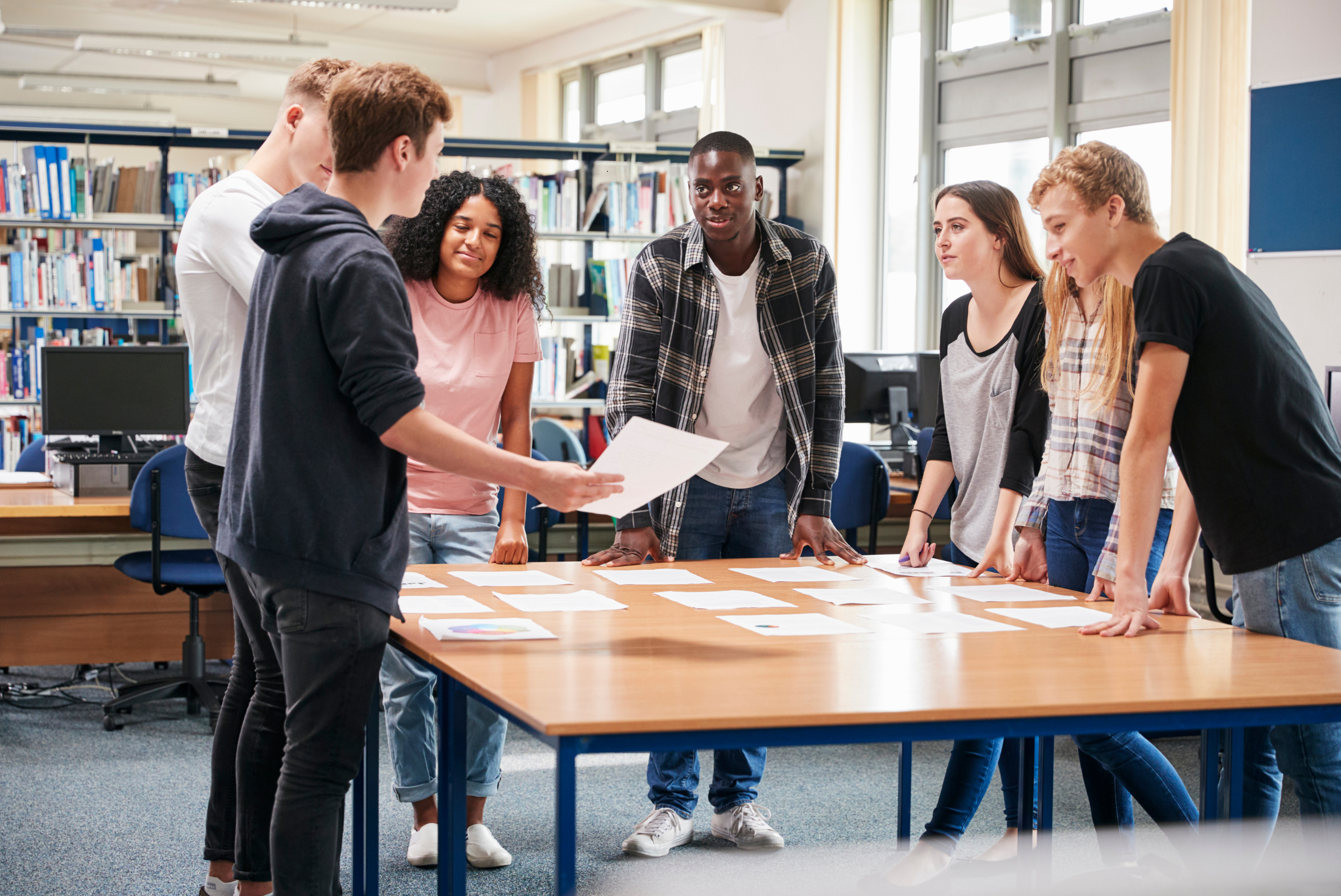 students collaborating at a table