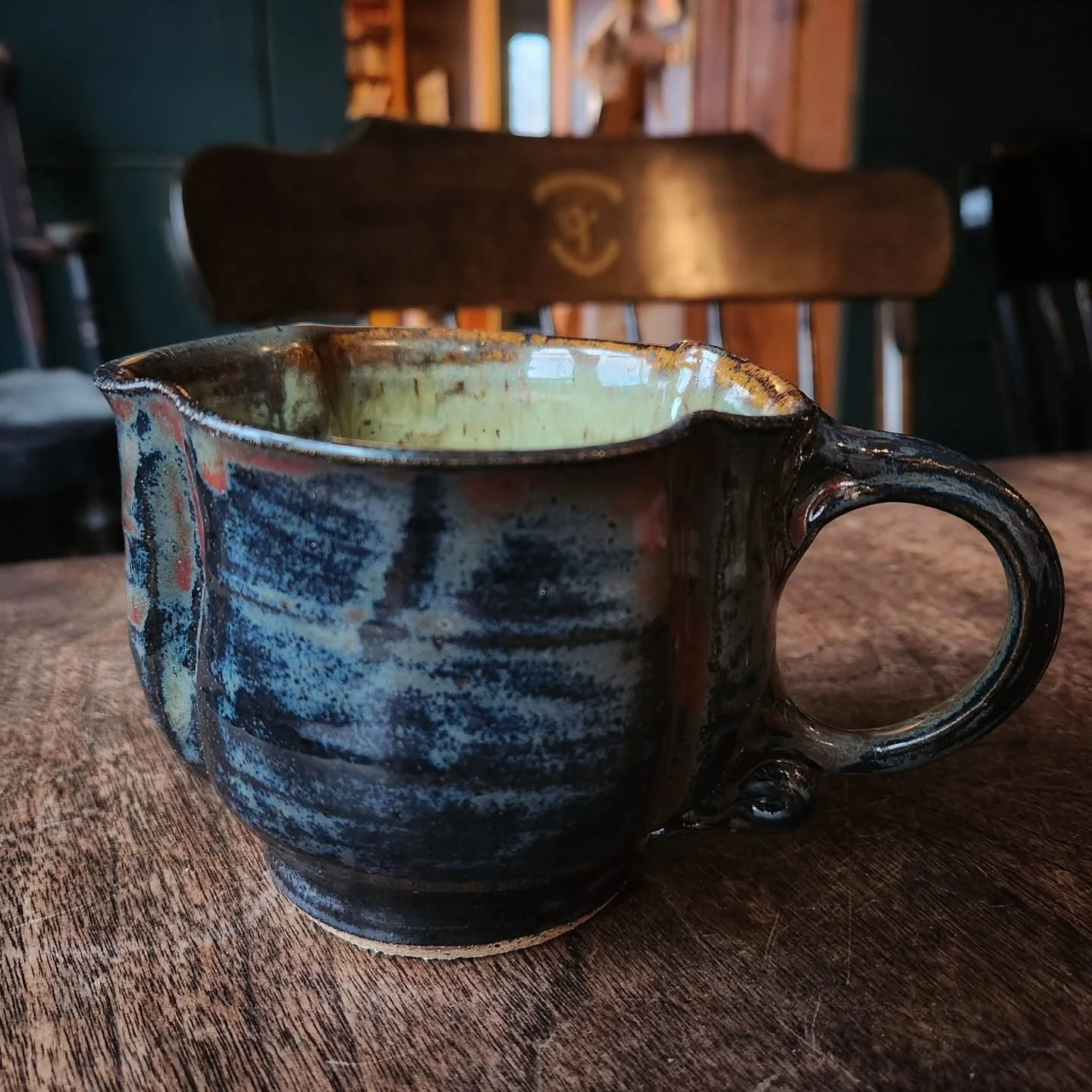 I thought i would show some pieces from my private reserve over the next week or two.
This is a recent addition, coming to live with me this summer.  I absolutely love the handle! It's just fantastically comfortable to my hands. Also,  the glaze is i