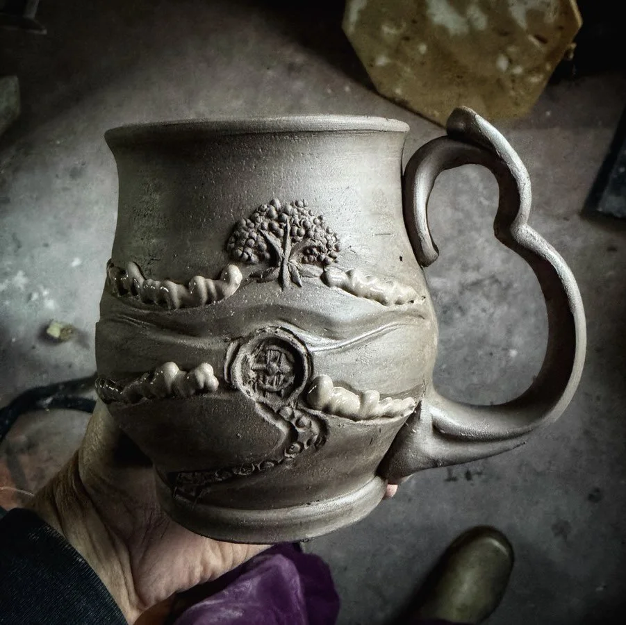 The road goes ever, ever on,
Down from the door where it began.

A new look for the Hobbitses this year. Making that tiny round door stamp did a little damage to my soul, but seeing this vision come to life restores it.
#thepotteress #mugsofmiddleear
