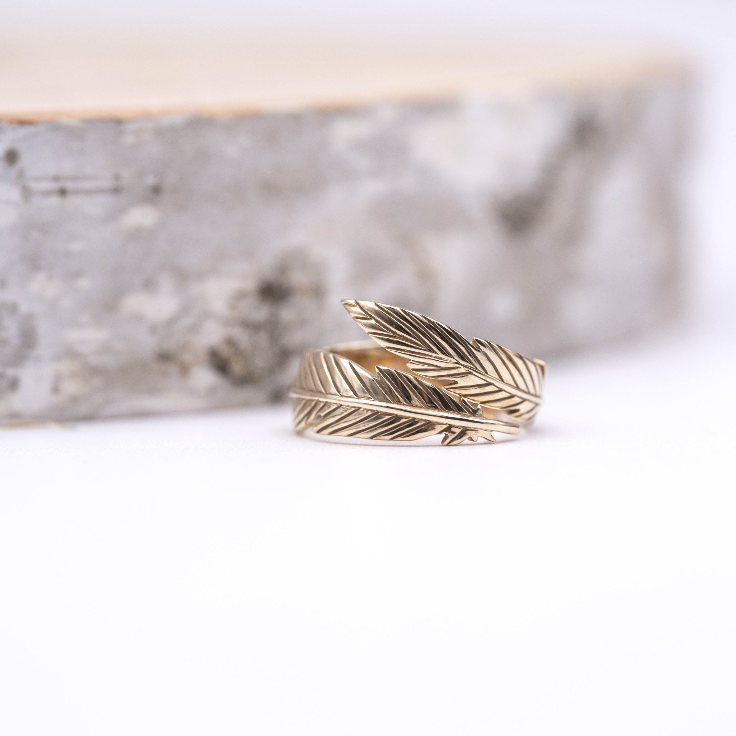 Bronze Adjustable Feather Ring embodies freedom and the wonders of the natural world. Wear it and soar with nature's grace.