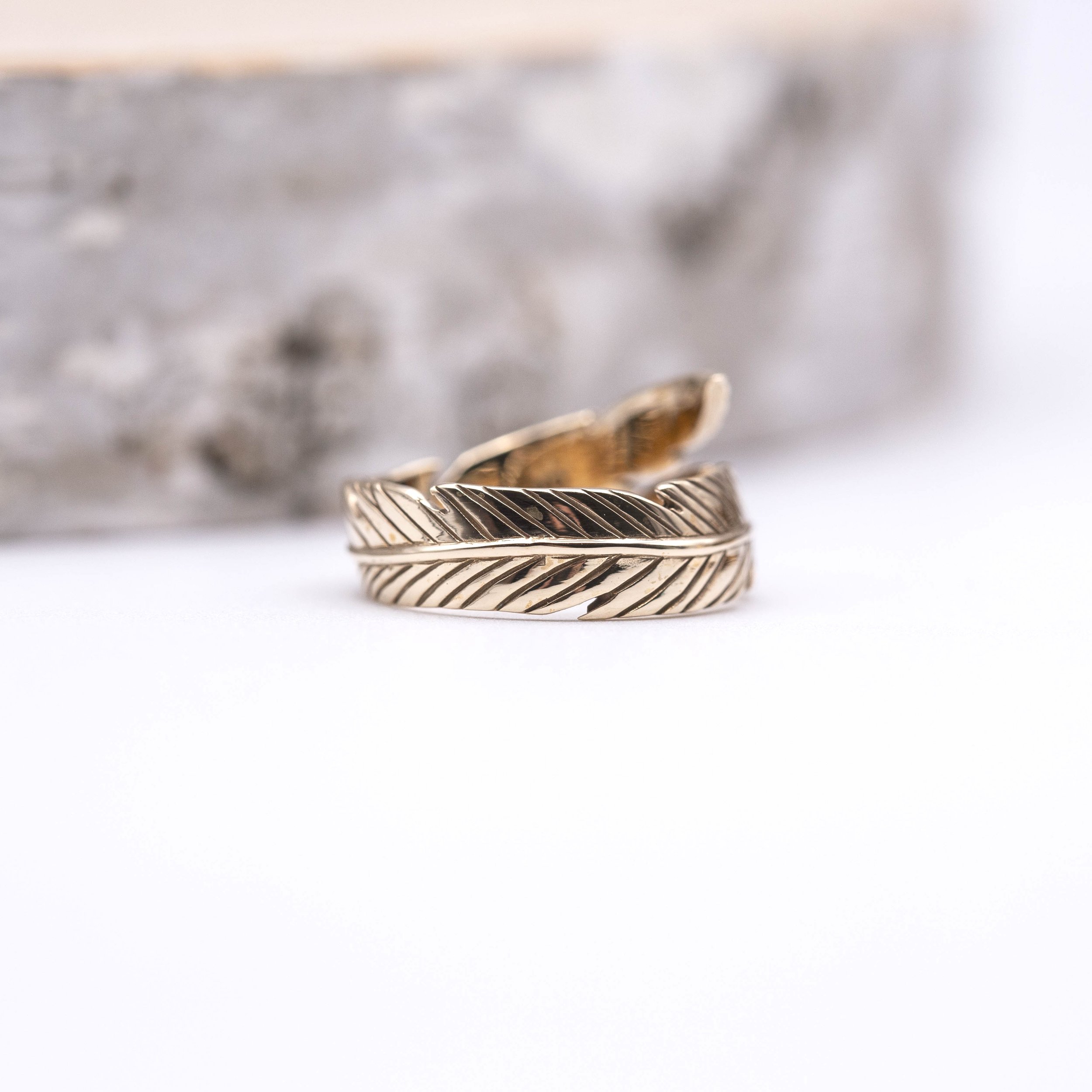 Bronze Adjustable Feather Ring embodies freedom and the wonders of the natural world. Wear it and soar with nature's grace.