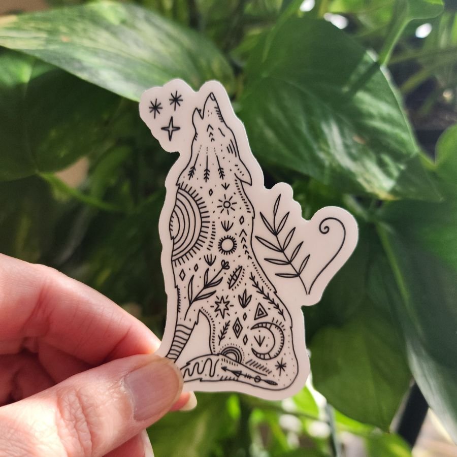 clear vinyl wolf sticker with stars moon sun arrows leaves and floral elements mystical nature design for forestcore and wild spirit aesthetic