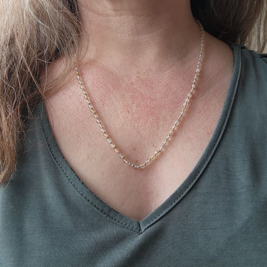 hand knotted citrine bead necklace with 4mm beads on pure silk cord finished with a silver lobster claw clasp handmade lightweight and elegant jewelry