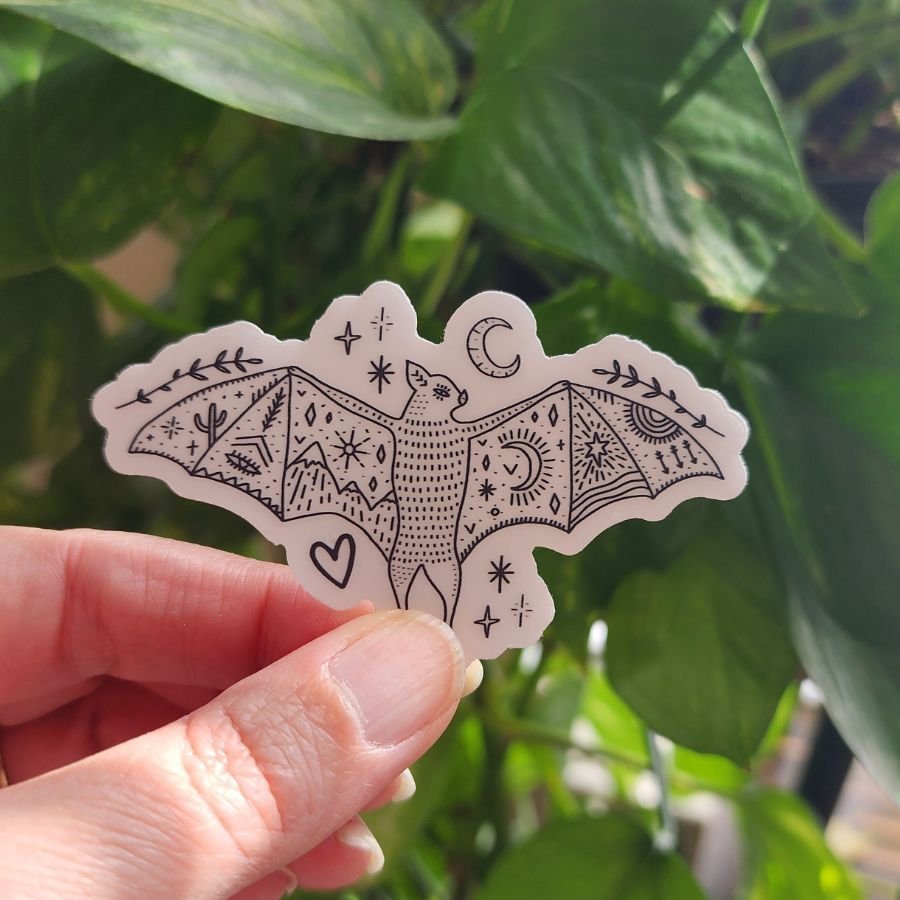clear vinyl bat sticker with moon mountains cactus stars arrows and leaves mystical desert and celestial design for night sky lovers