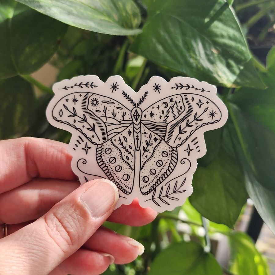 clear butterfly sticker with leaves trees cactus moon and stars nature inspired design with desert and forestcore aesthetic