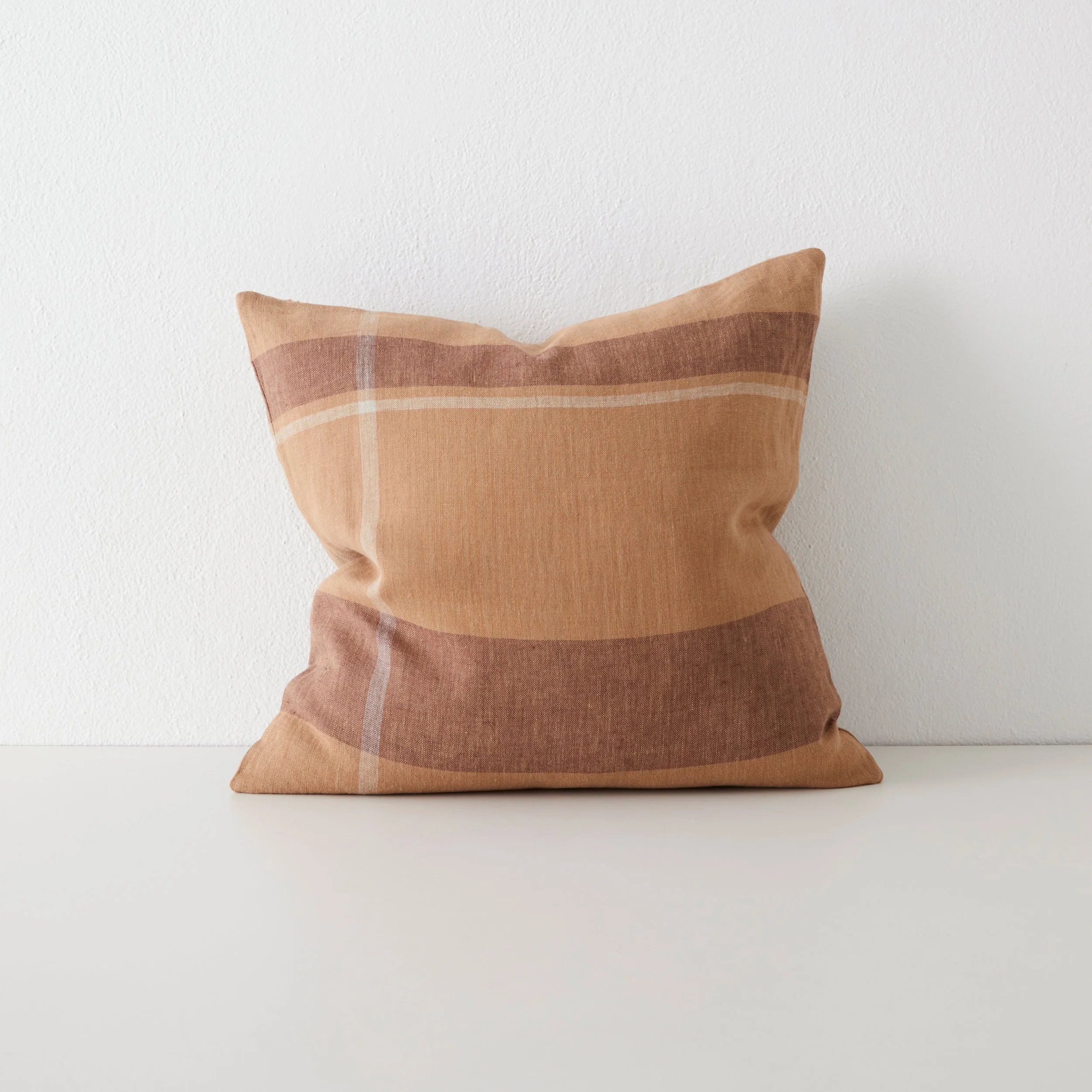 Dante-cushion-terracotta-relaxed-front.jpg