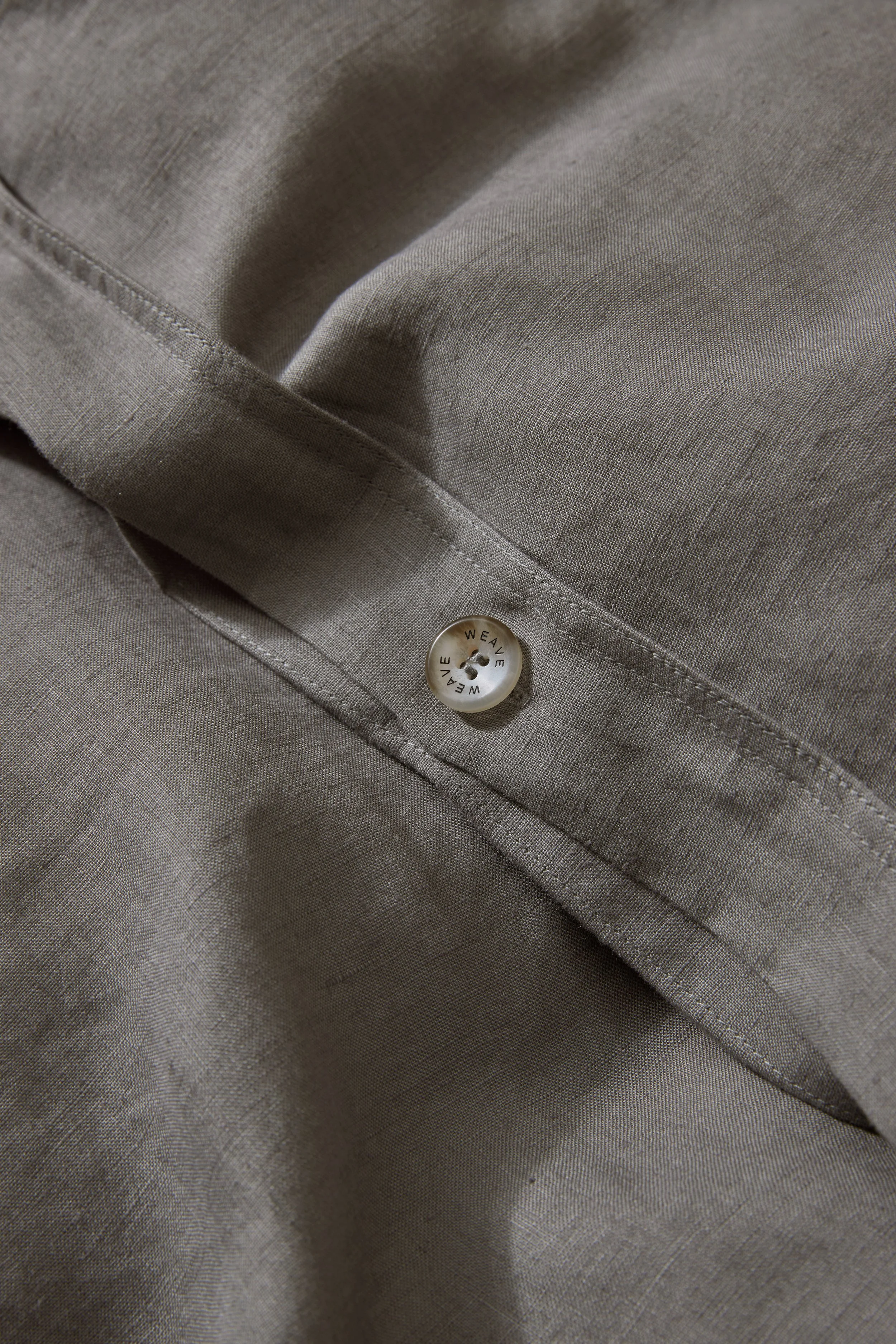 Weave_Charcoal_Button-LR.jpg