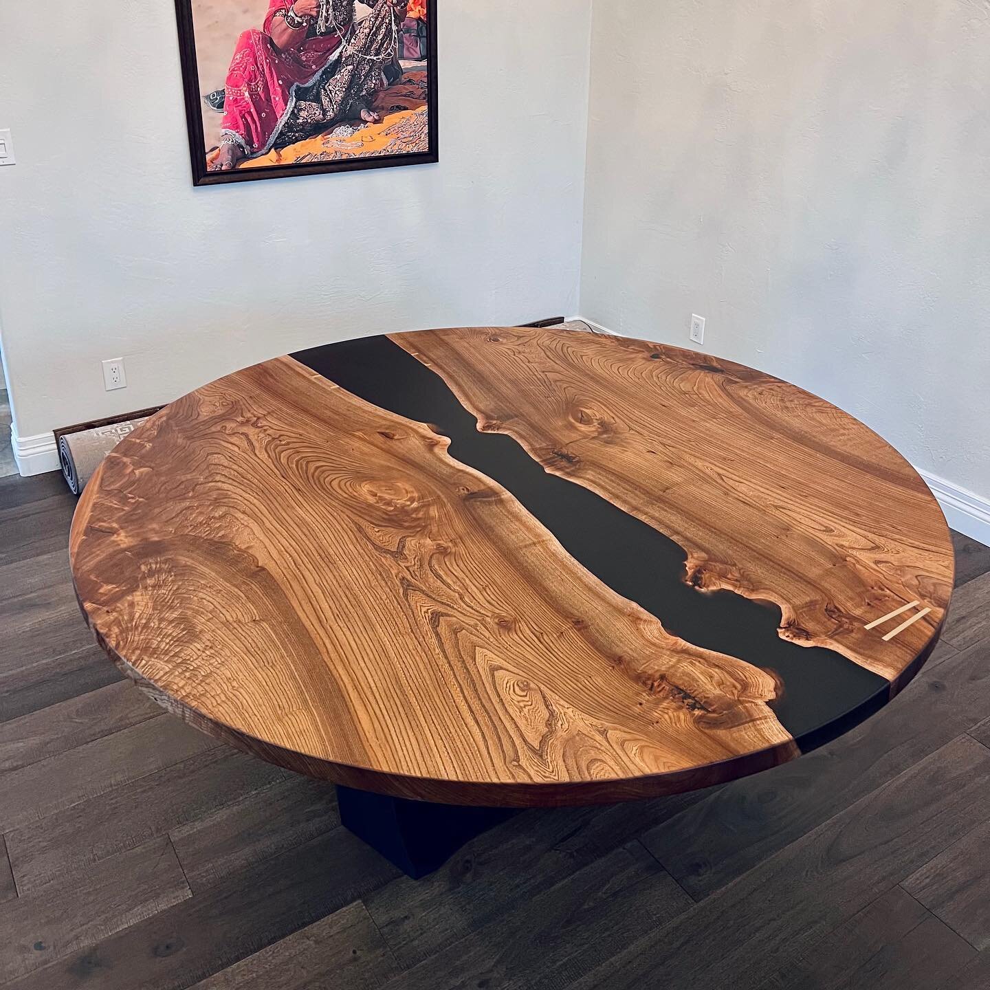 75&rdquo; Round Elm River Table with semi-translucent black epoxy and brass inlay. Seats 8 and creates memories that will last generations.