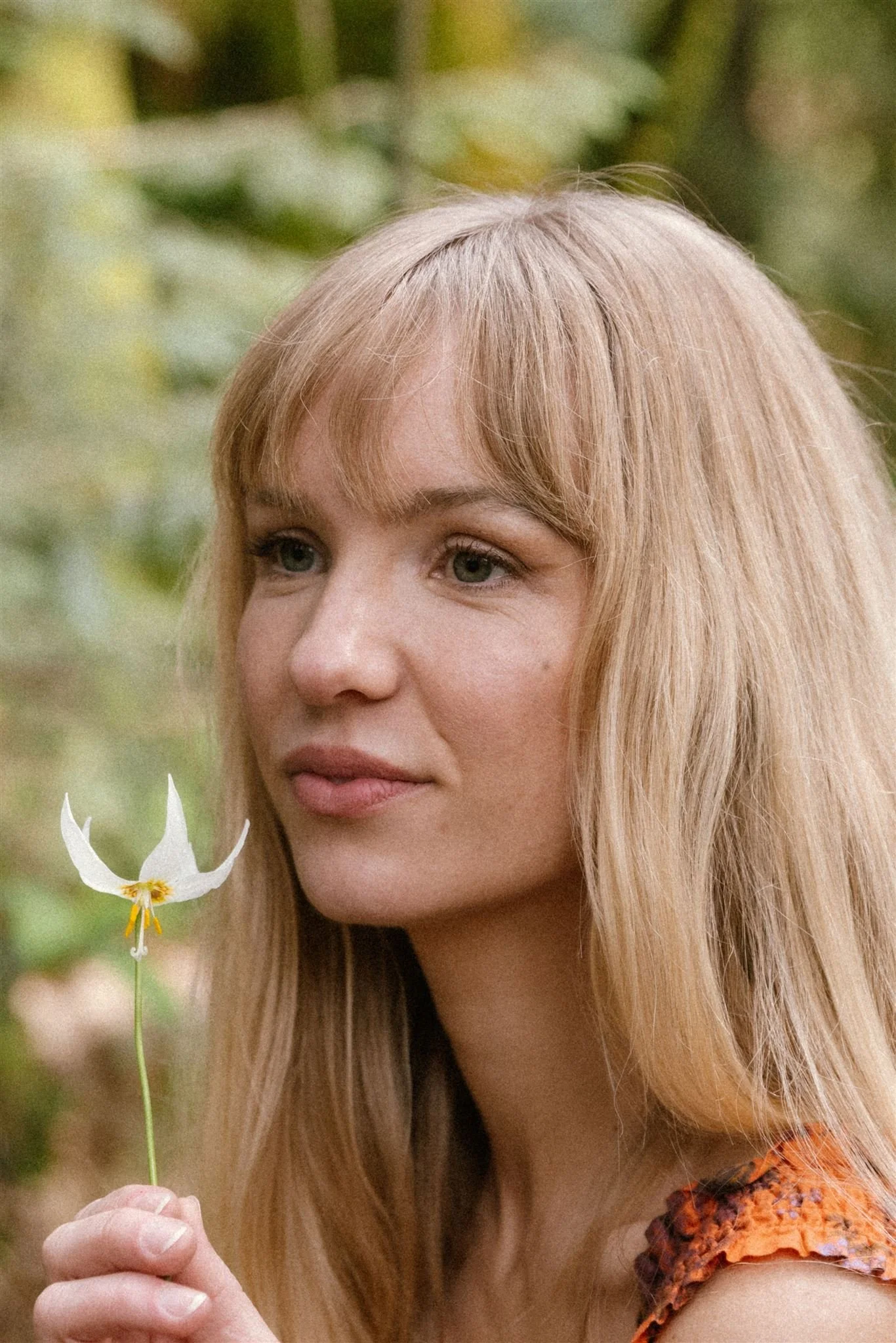 Woman holding a flower