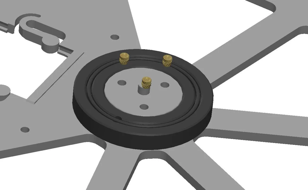  Insert 3 M3 heat inserts to the top of the  WHEEL BASE.  