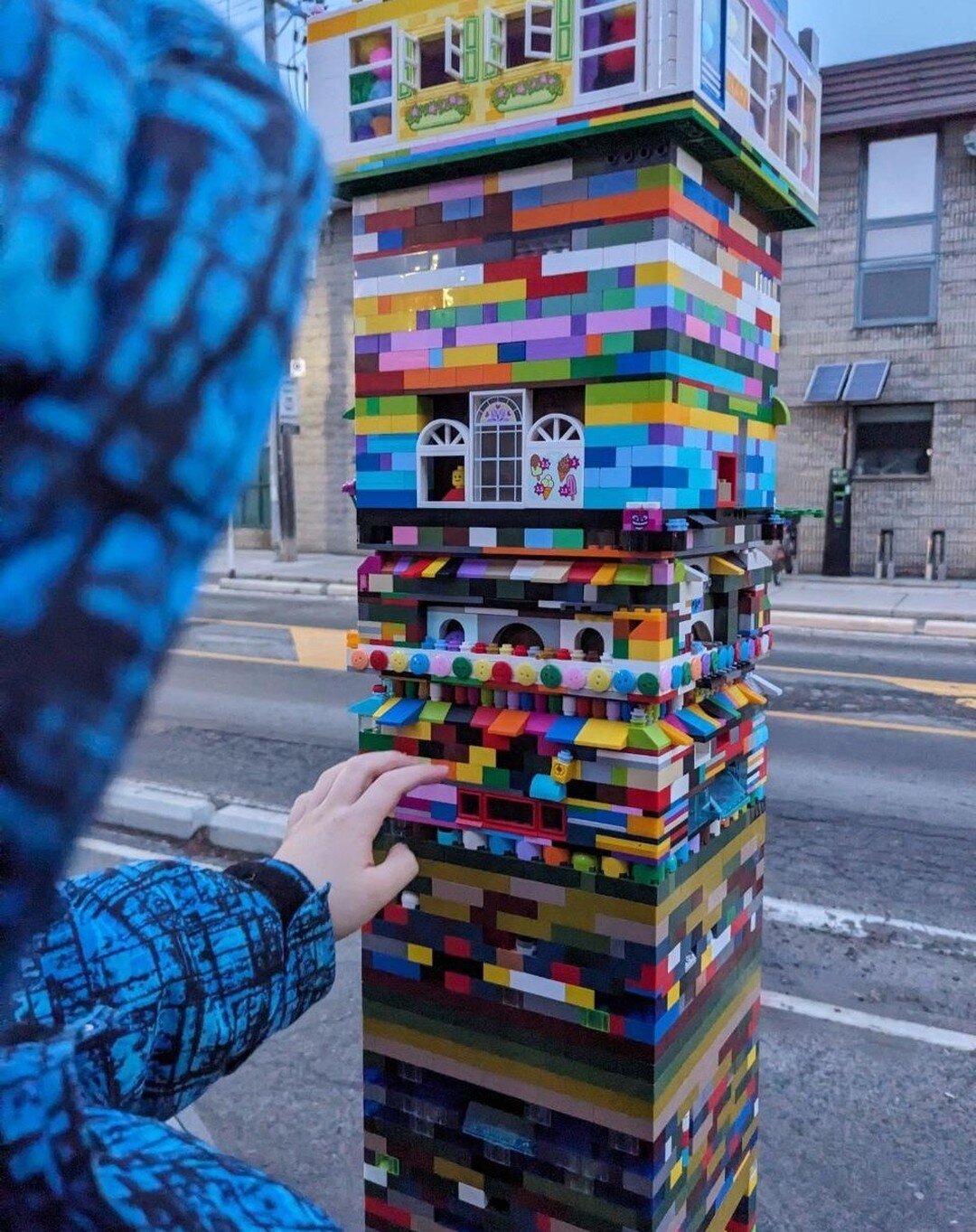 Meanwhile in my hometown of Toronto, a street pole is being turned into a massive interactive LEGO tower, lead by artists Martin Reis and Sean Martindale.

My friend Andrew and his little human went to check it out... and sent me this photo.

The bes