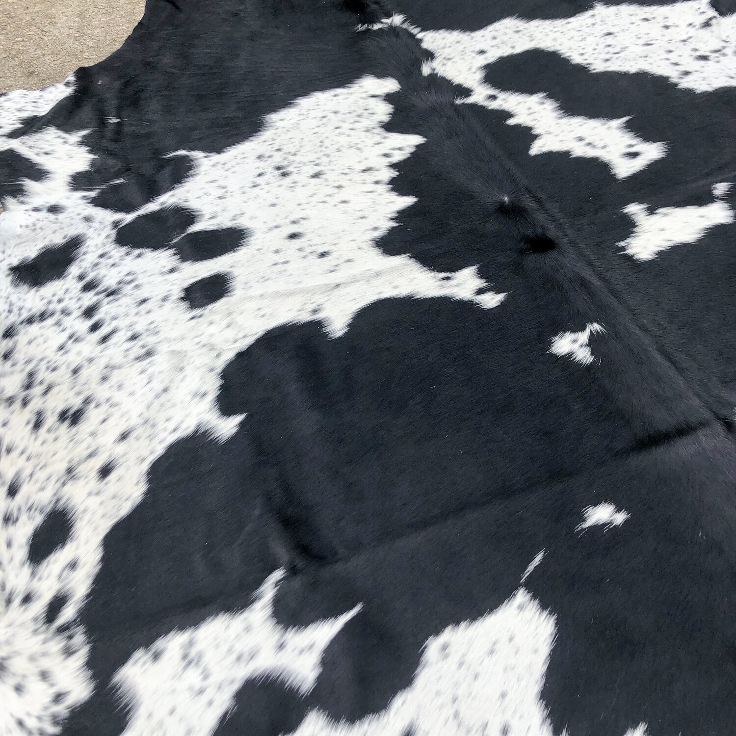 XL Size - Spotted Black & White Cowhide Rug — Farmericana Designs