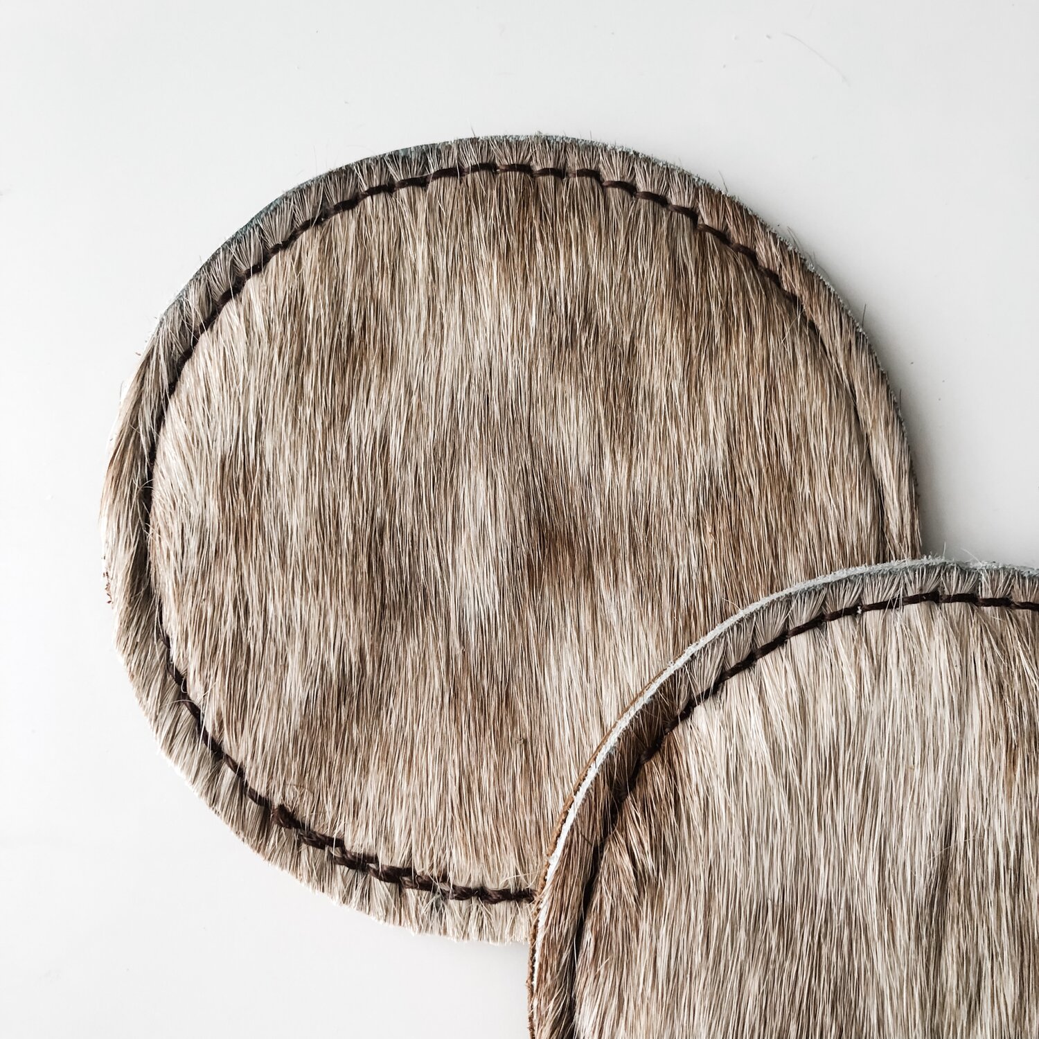 Cowhide Coasters - Round – Mealeys Gift And Sauna Shop