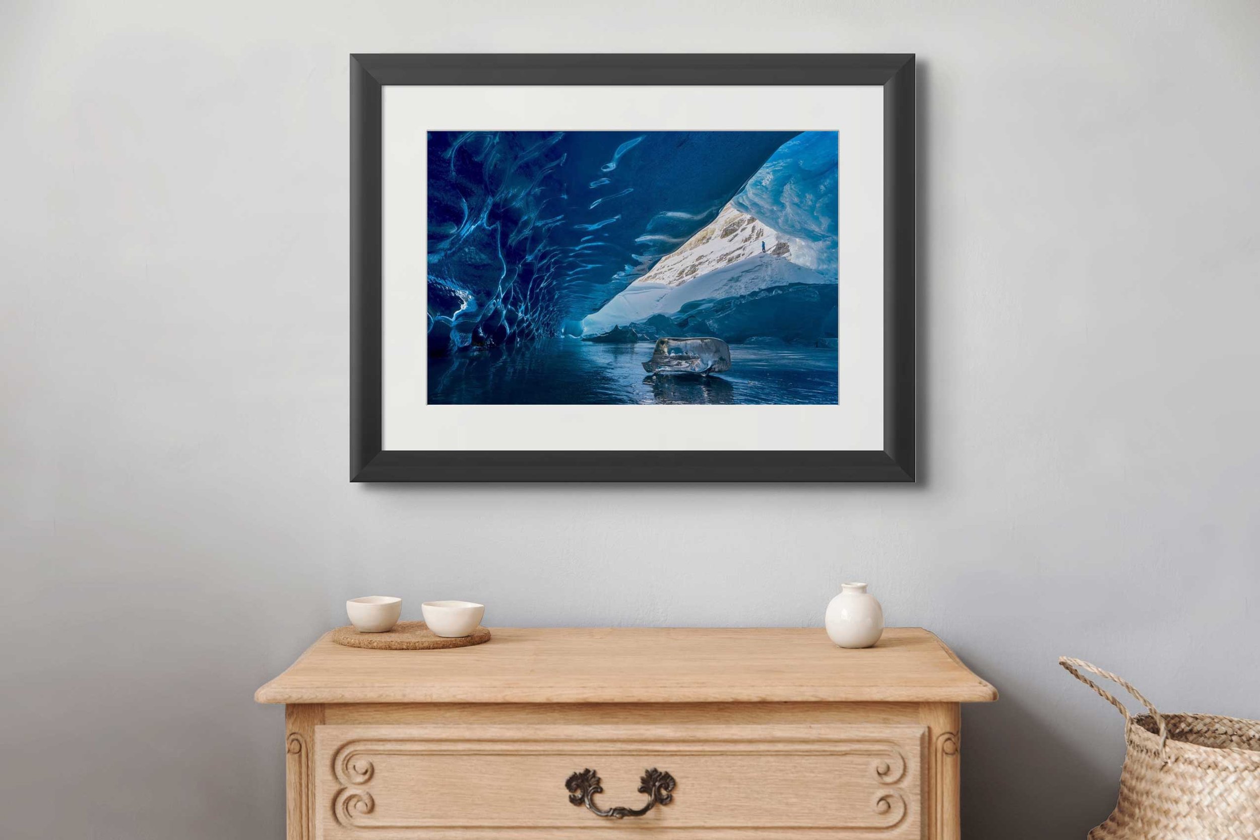 Mockup of a framed photograph in a modern room.