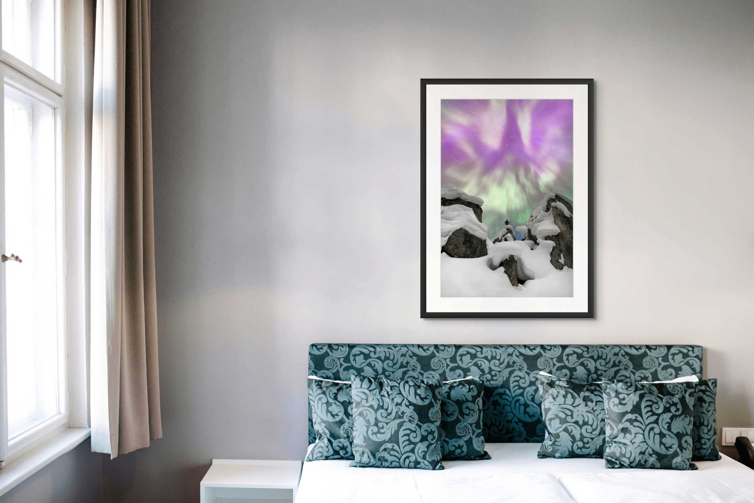 Mockup of a framed photograph in a modern room.