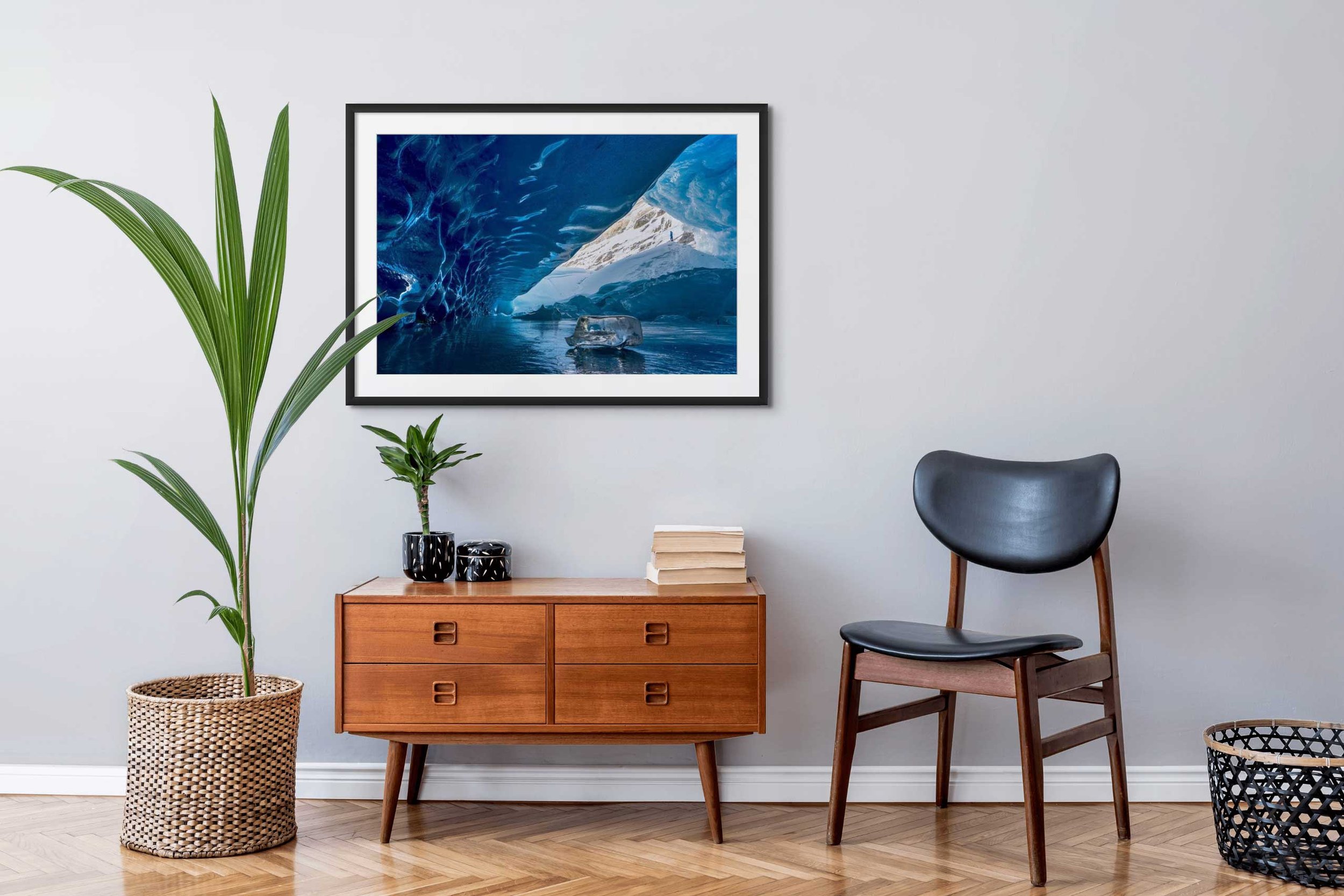 Mockup of a framed photograph in a modern room.