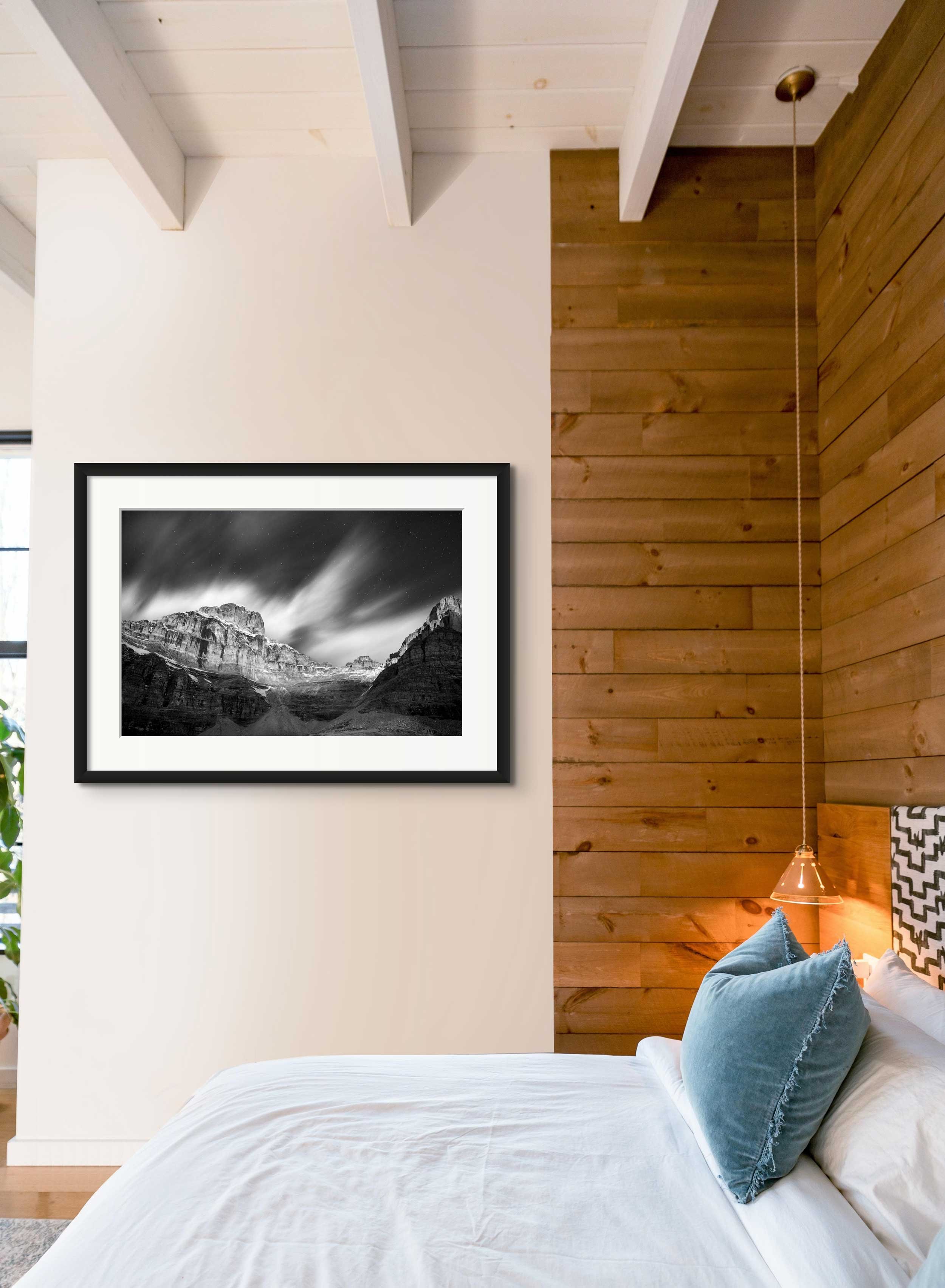 Mockup of framed photograph in modern room.