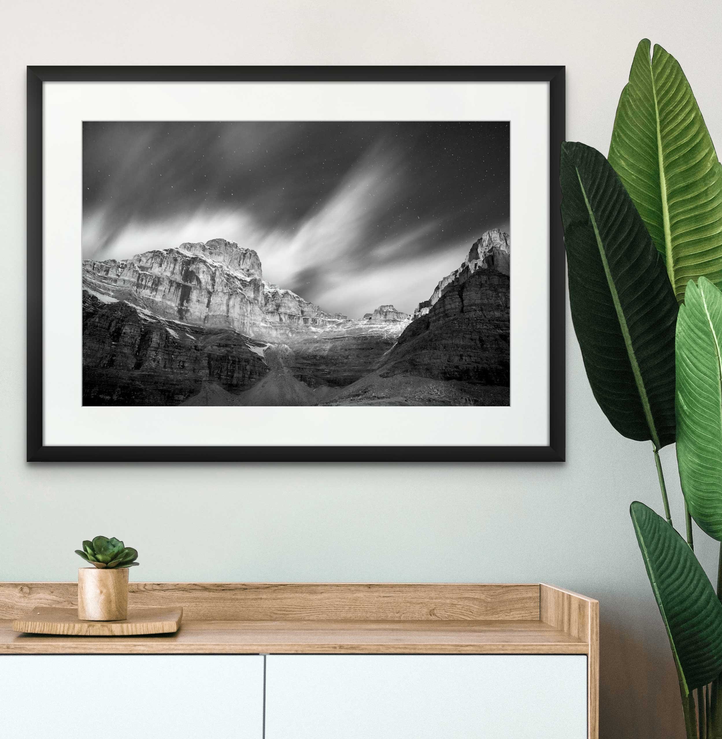 Mockup of framed photograph in modern room.