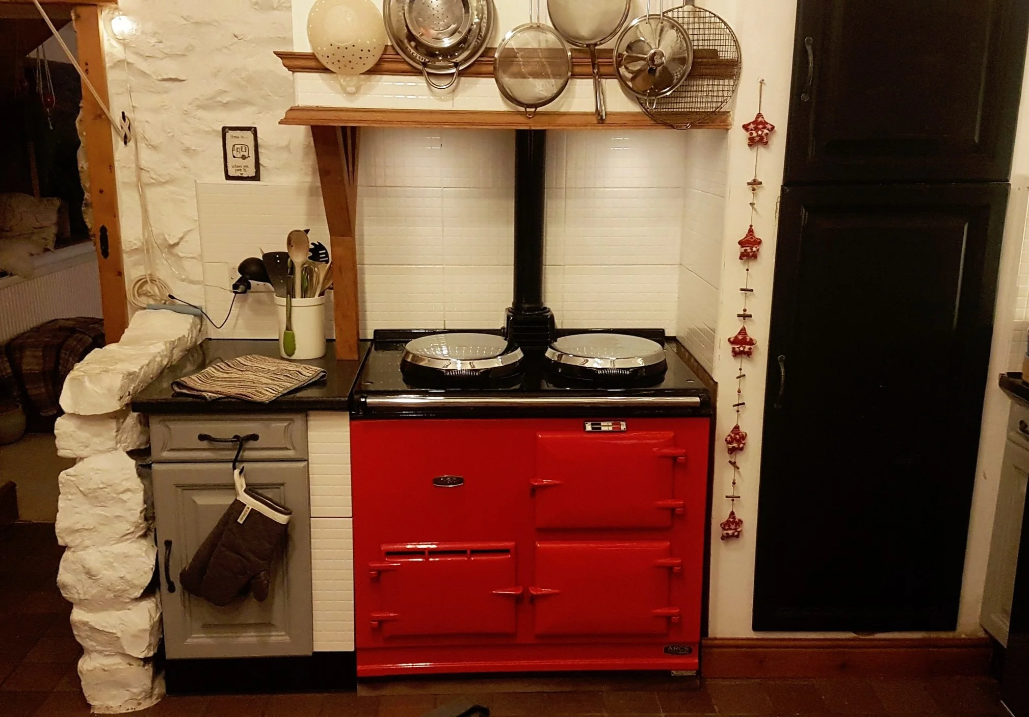 Picture of a red oil AGA that is to be converted to Electric for Clients in Anglesey