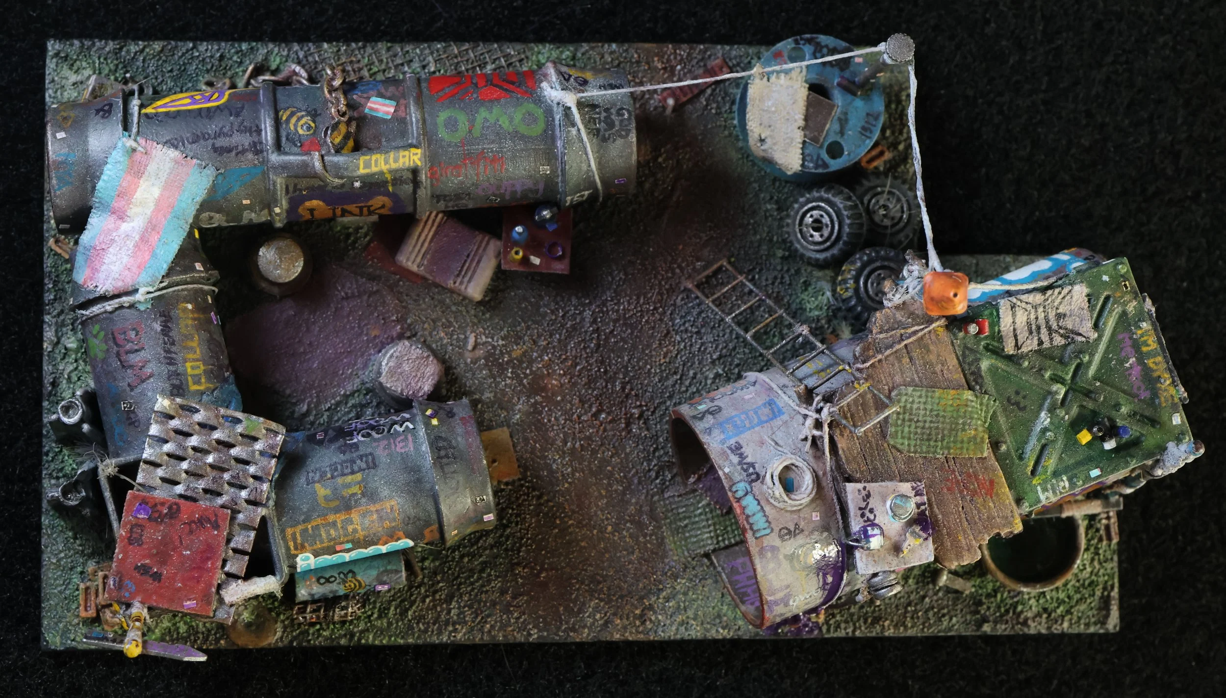 Recycled materials and found objects reimagined as inhabited places. 