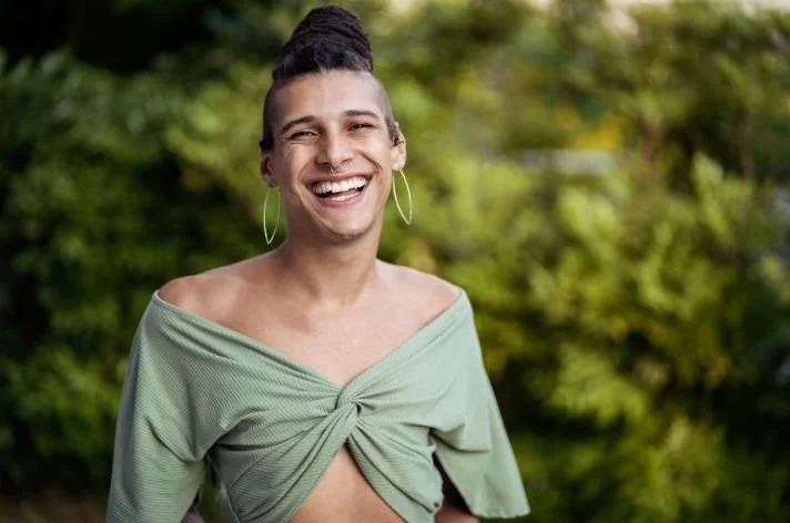 Person smiling after their first gender-affirming therapy session in Minneapolis