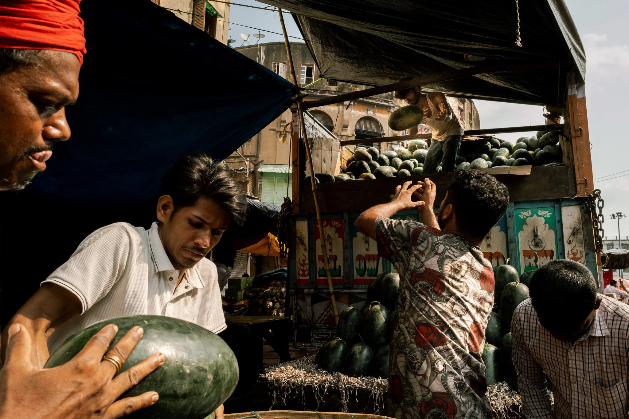Kolkata Fruit Market. Men shopping for Watermelons. 