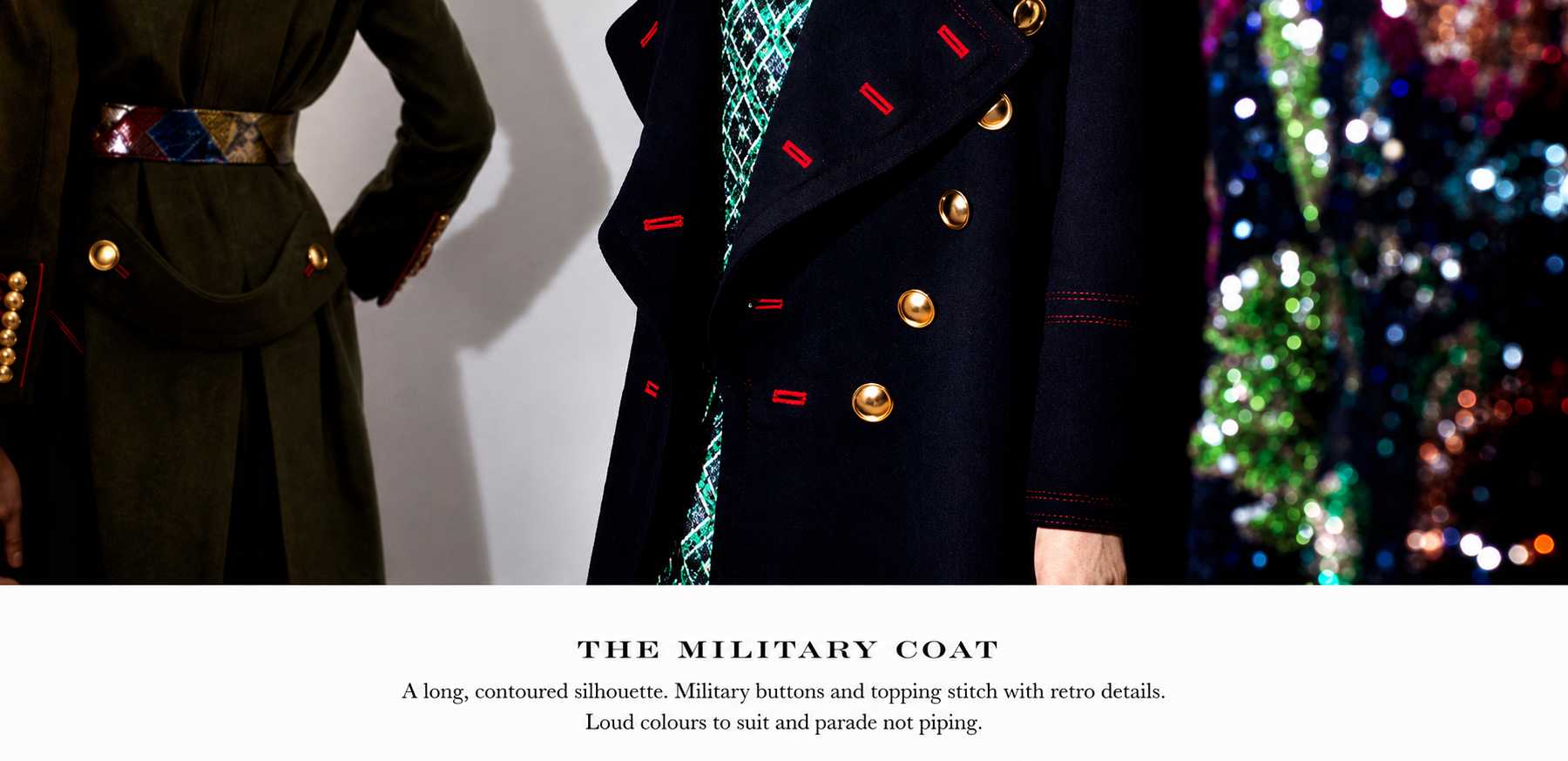 Close-up of a fashion display featuring a navy blue military coat with gold buttons, red stitching details, and a patterned shirt underneath. To the left, part of a dark coat with decorative buttons and a multicolored belt. To the right, a heavily se