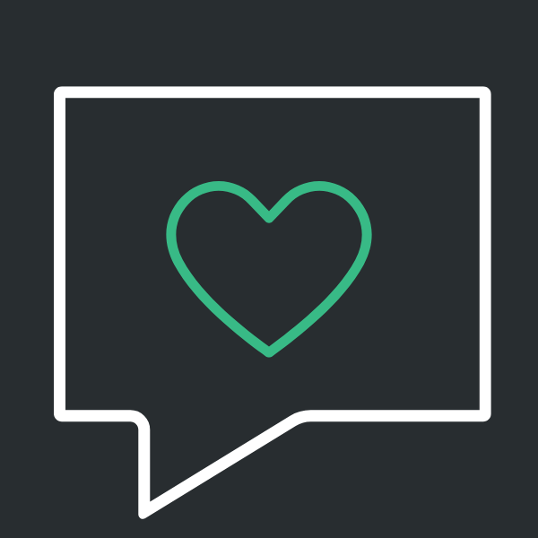 Speech bubble with a heart inside, symbolizing love or affection.