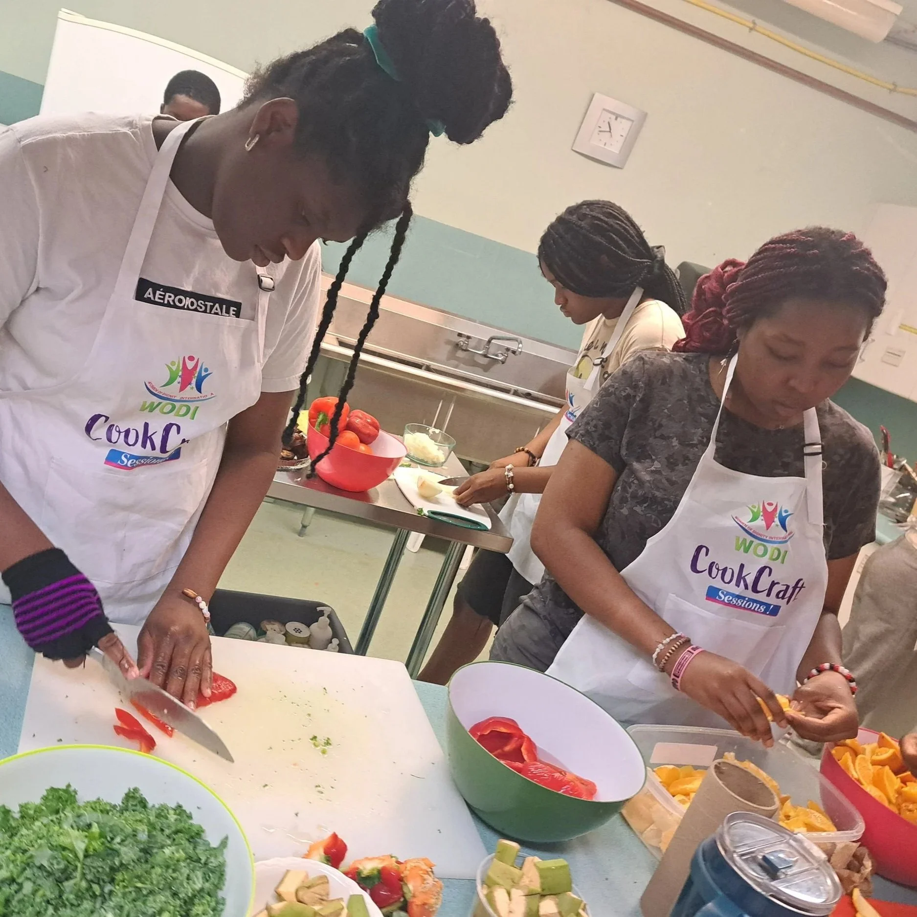 Three campers are shown cooking