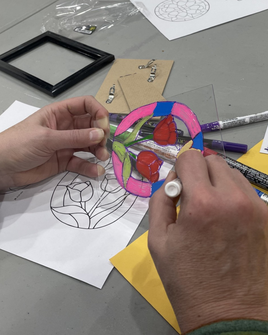 Close up of a persons hands as they craft