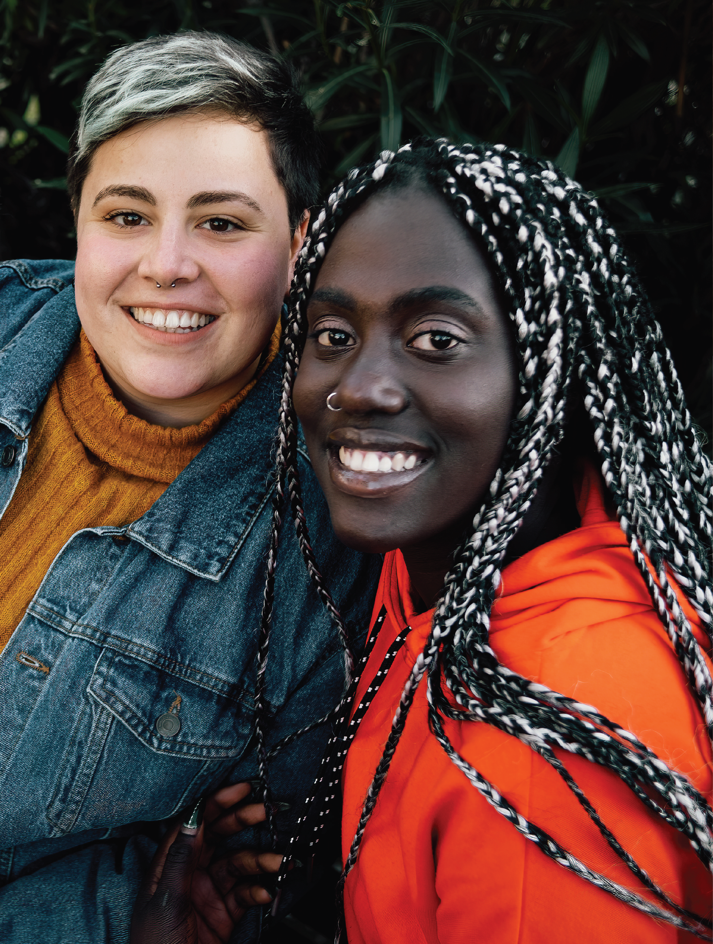 Portrait of multicultural girlfriends looking at the camera - only women concept