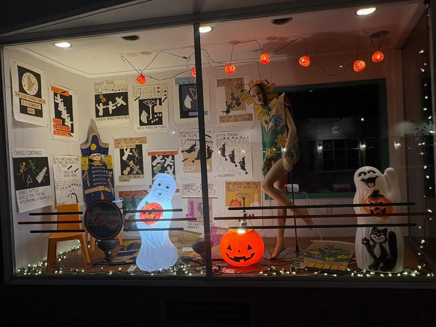 New Halloween window! Thank you to @bluefishdesignsma for hooking me up with BOTH the music class/performance sheets AND the #1970s paper costumes!  We have more costumes inside.  Selling for $5 each because they are fab but somewhat fragile.