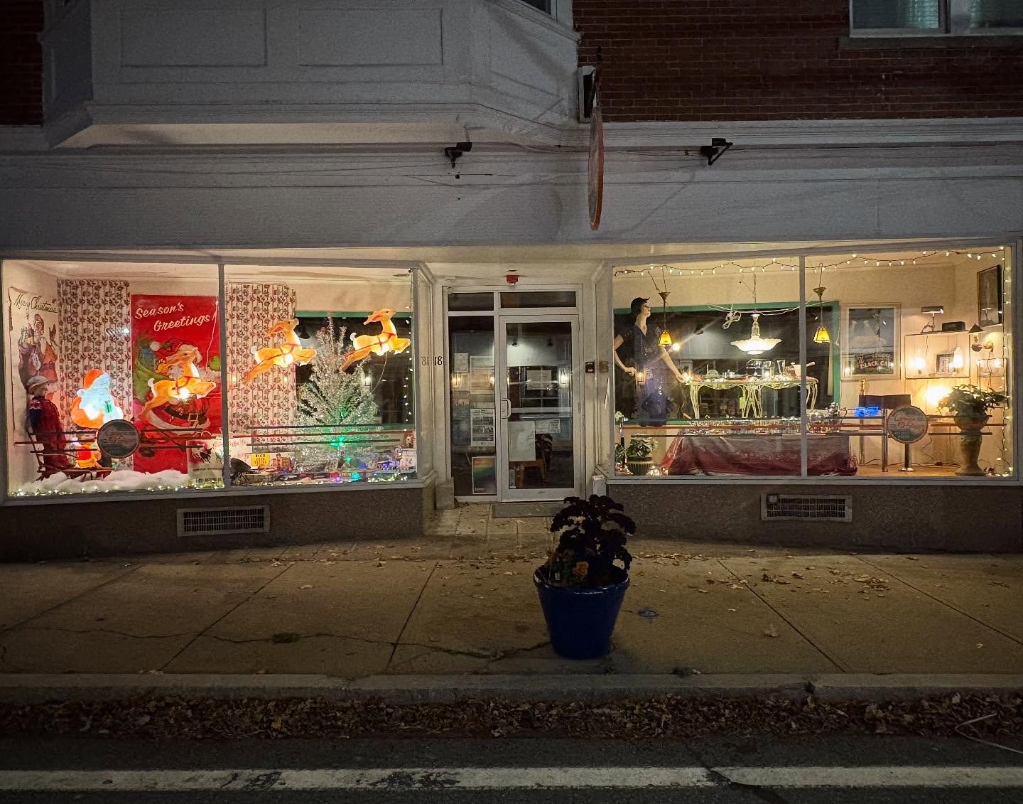 We'll post better photos next week but both holiday windows are complete!  Please note that we have posted a list with prices of items both inside and out so you can see details and prices of items in both windows.